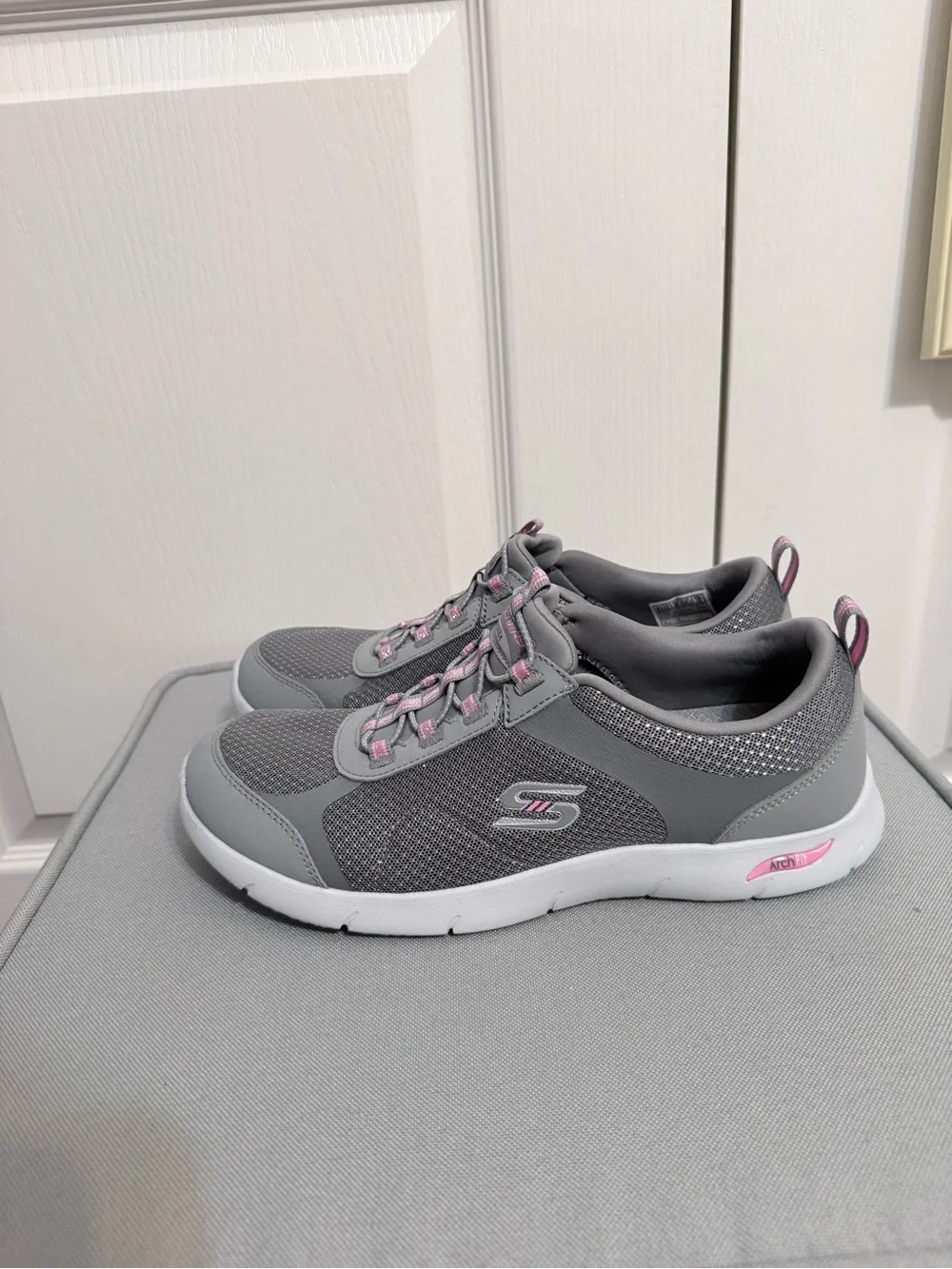 Gray Slip-On Sneakers with Pink Accents